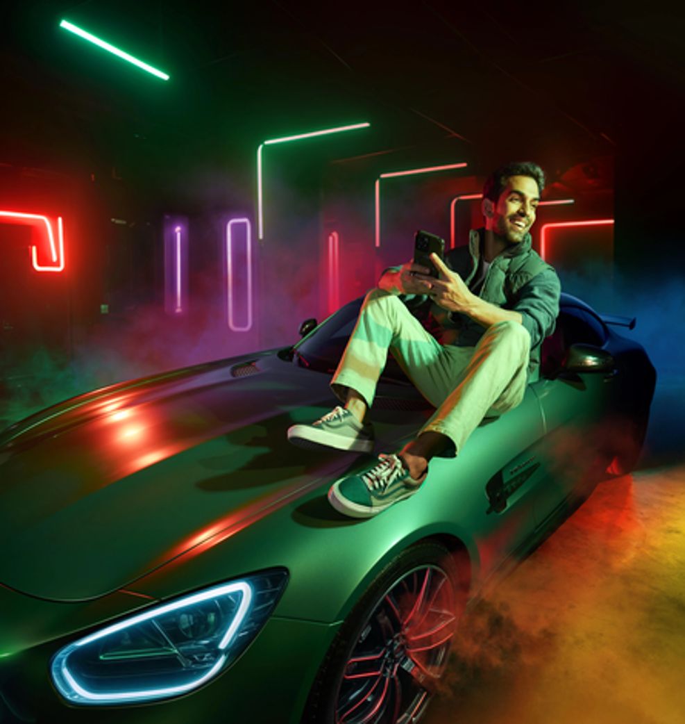 GUY BROWSING ON TOP OF CAR_01080 Final v02.webp
